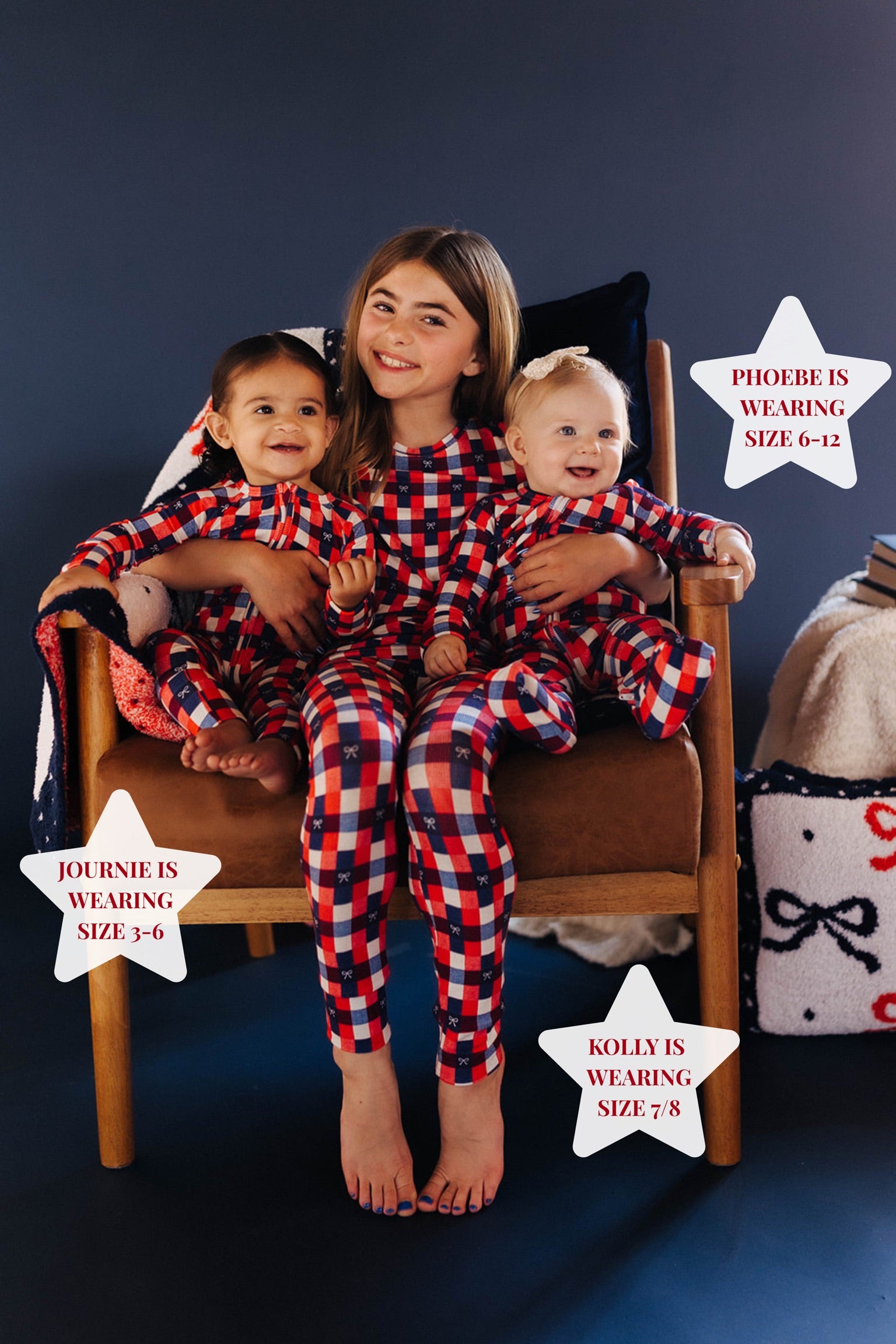 three girls posing in matching pjs