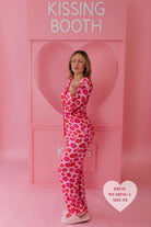 Bri in the XS kiss pjs blowing a kiss at the camera