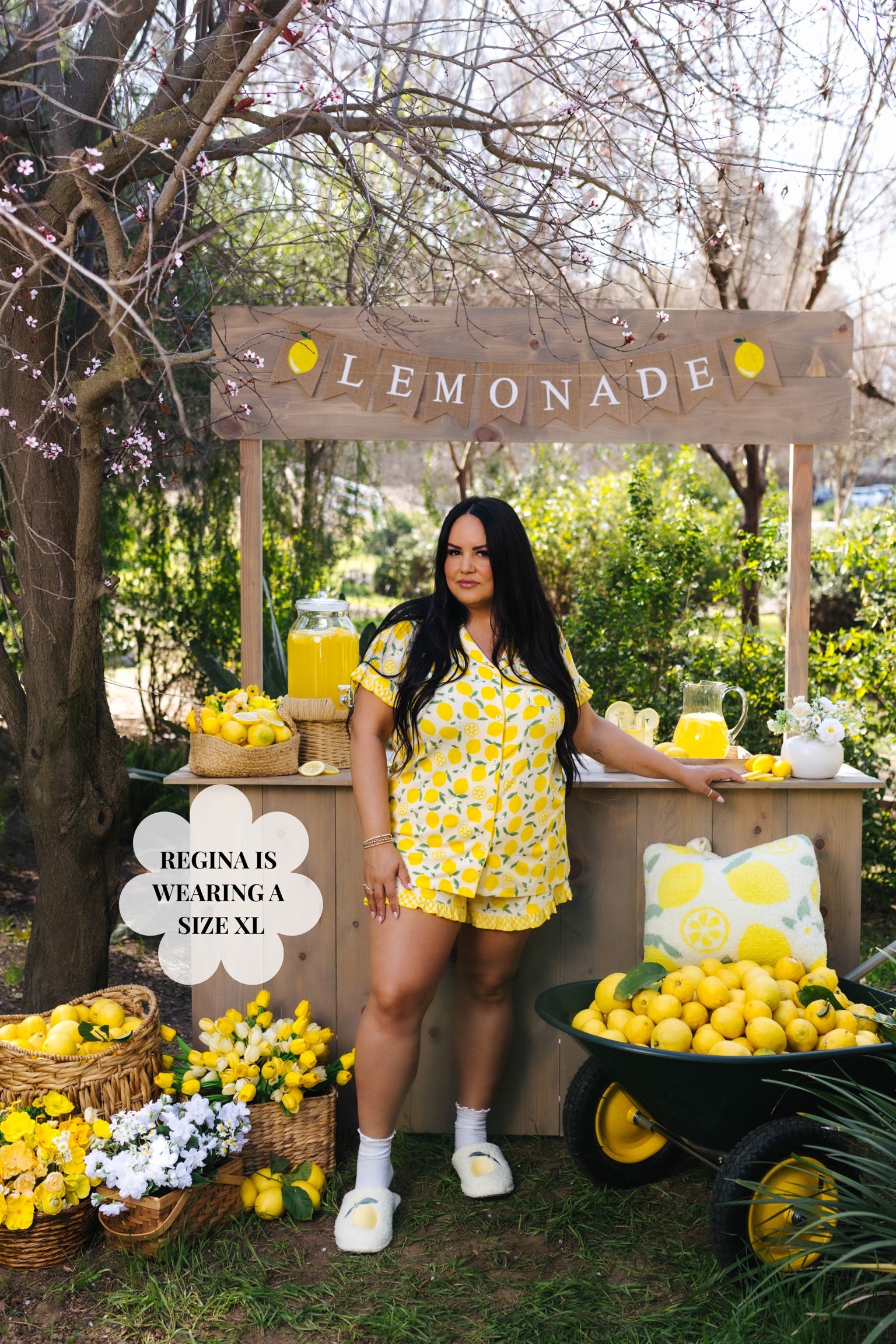 Regina posing in the XL pjs in front of the lemonade stand