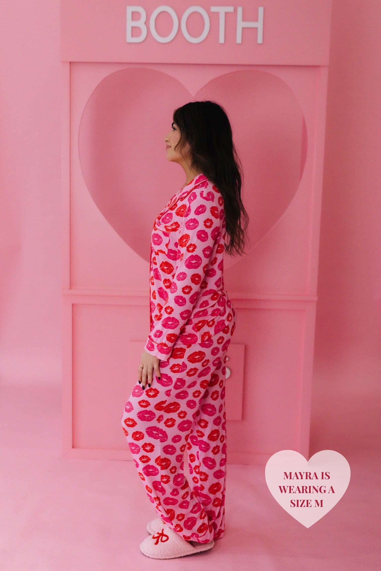 Mayra turned to the side showing the side profile of the pjs 
