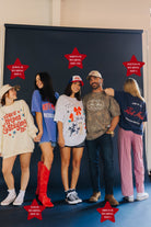 Group of people wearing the Hot Mess merch