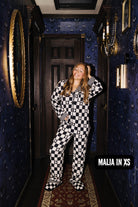 Malia in XS pajamas smiling