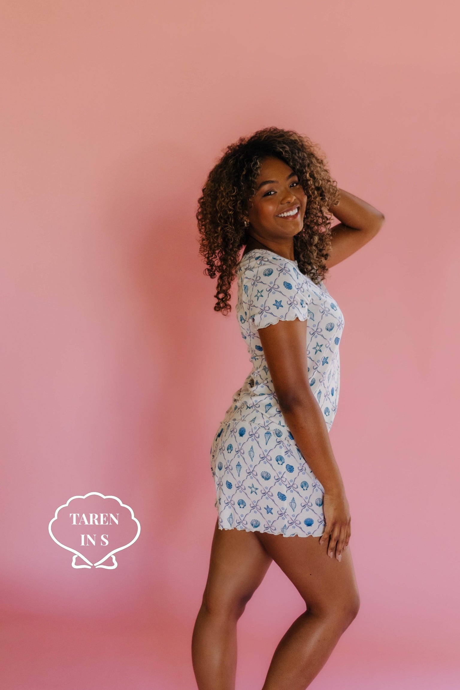 Woman wearing a shell pj set in size S