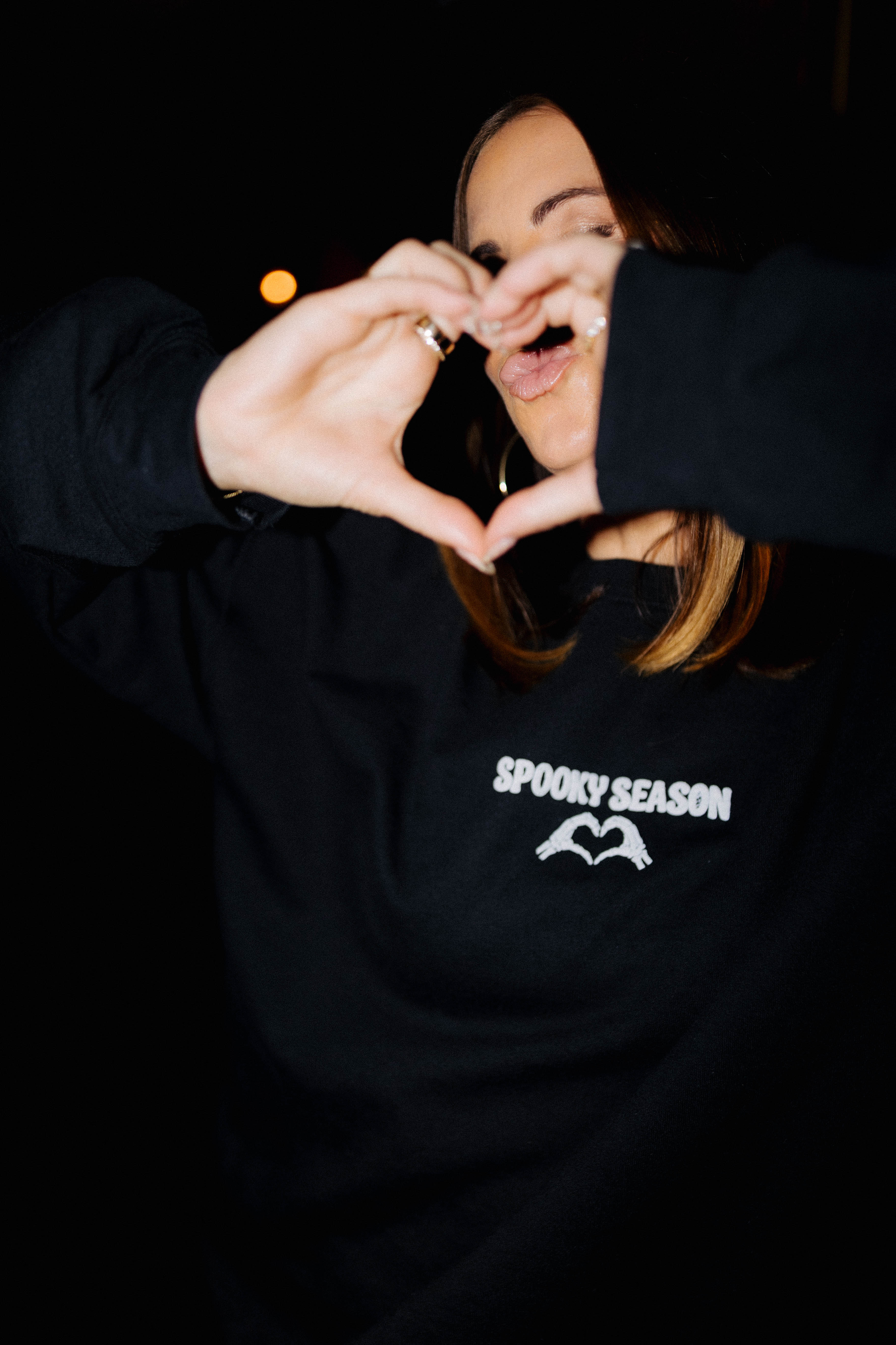Adult Spooky Season Sweatshirt shown in a full length lifestyle view