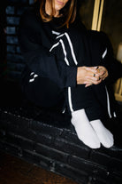 Black Sweatpants styled in the Halloween campaign setting