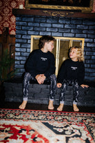 Kid Spooky Season Sweatshirt shown in a full length lifestyle view