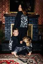 Kid Spooky Season Sweatshirt styled in the Halloween campaign setting