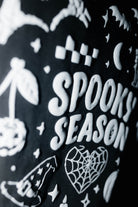 Close view of the Spooky Season tee graphic