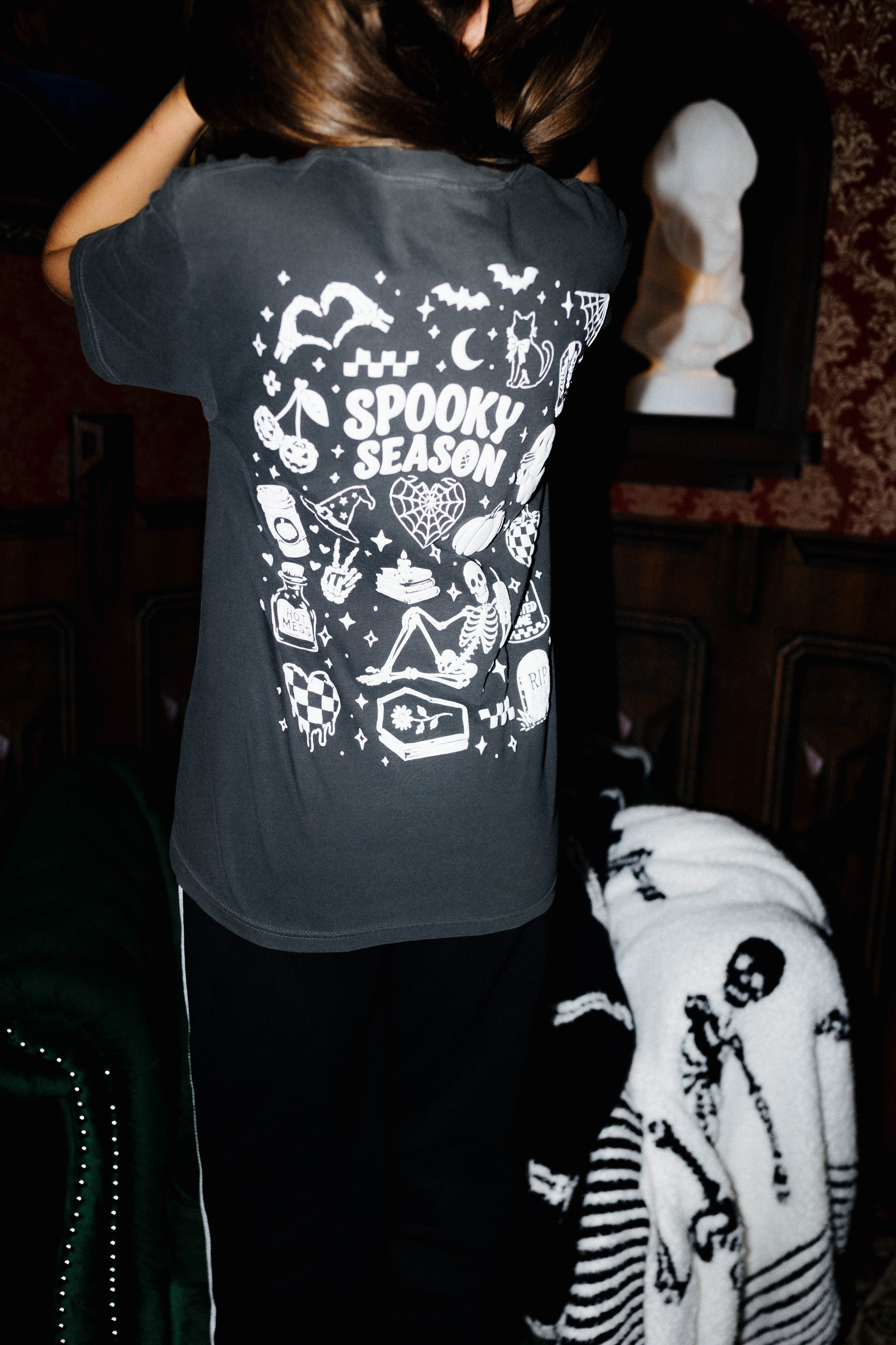 Adult Spooky Season Tee styled in the Halloween campaign setting