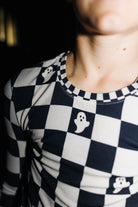 Close view of the check neckline on kids Ghost Check pajamas