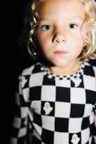 Kids Ghost Check Ribbed Pajama Set styled in the Halloween campaign setting