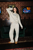 Tan 100% Cotton Hot Mess Patch Sweatshirt shown in a full length lifestyle view
