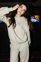 Tan 100% Cotton Hot Mess Patch Sweatshirt shown in a closer detail view