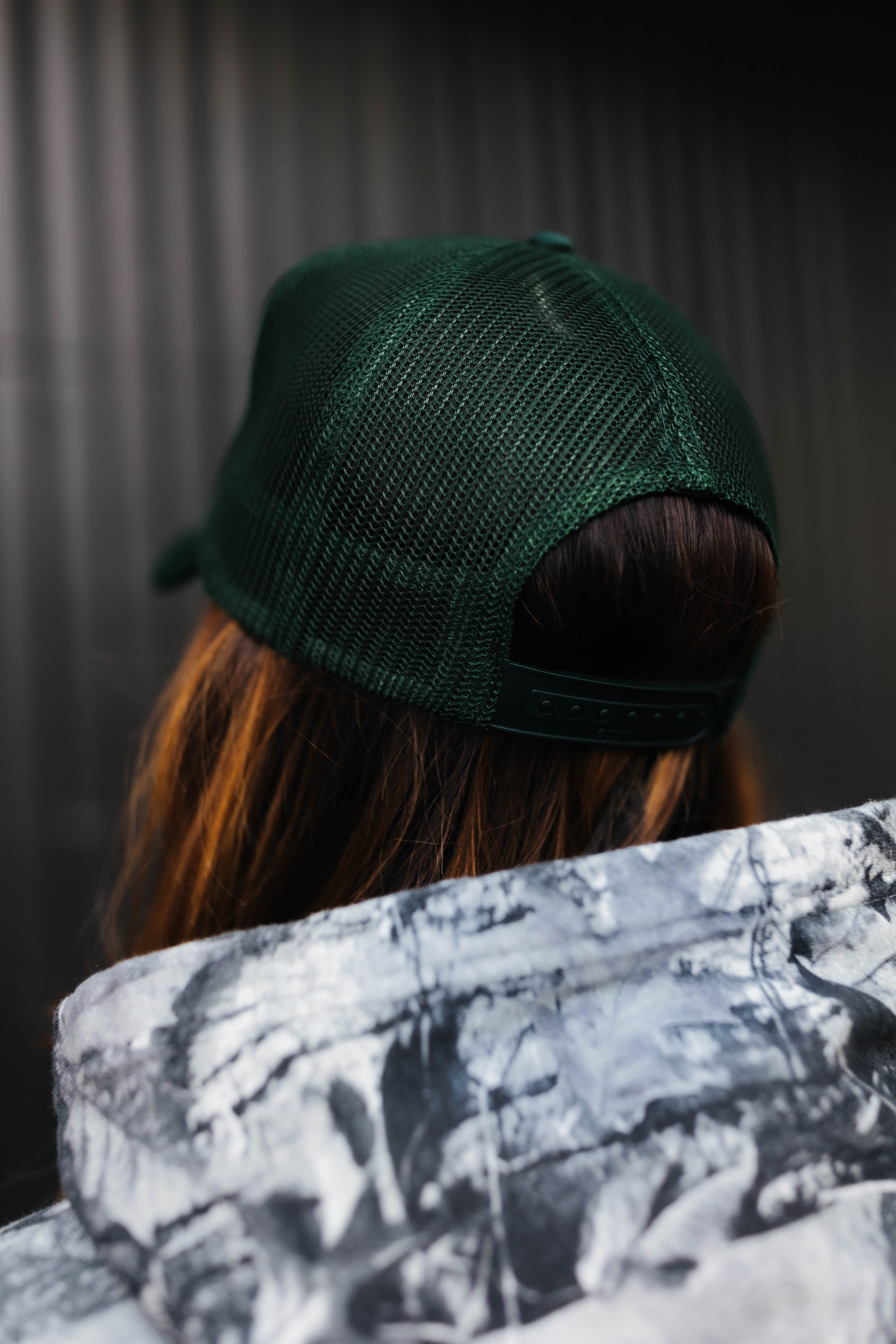 back of dark green hot mess at heart hat 