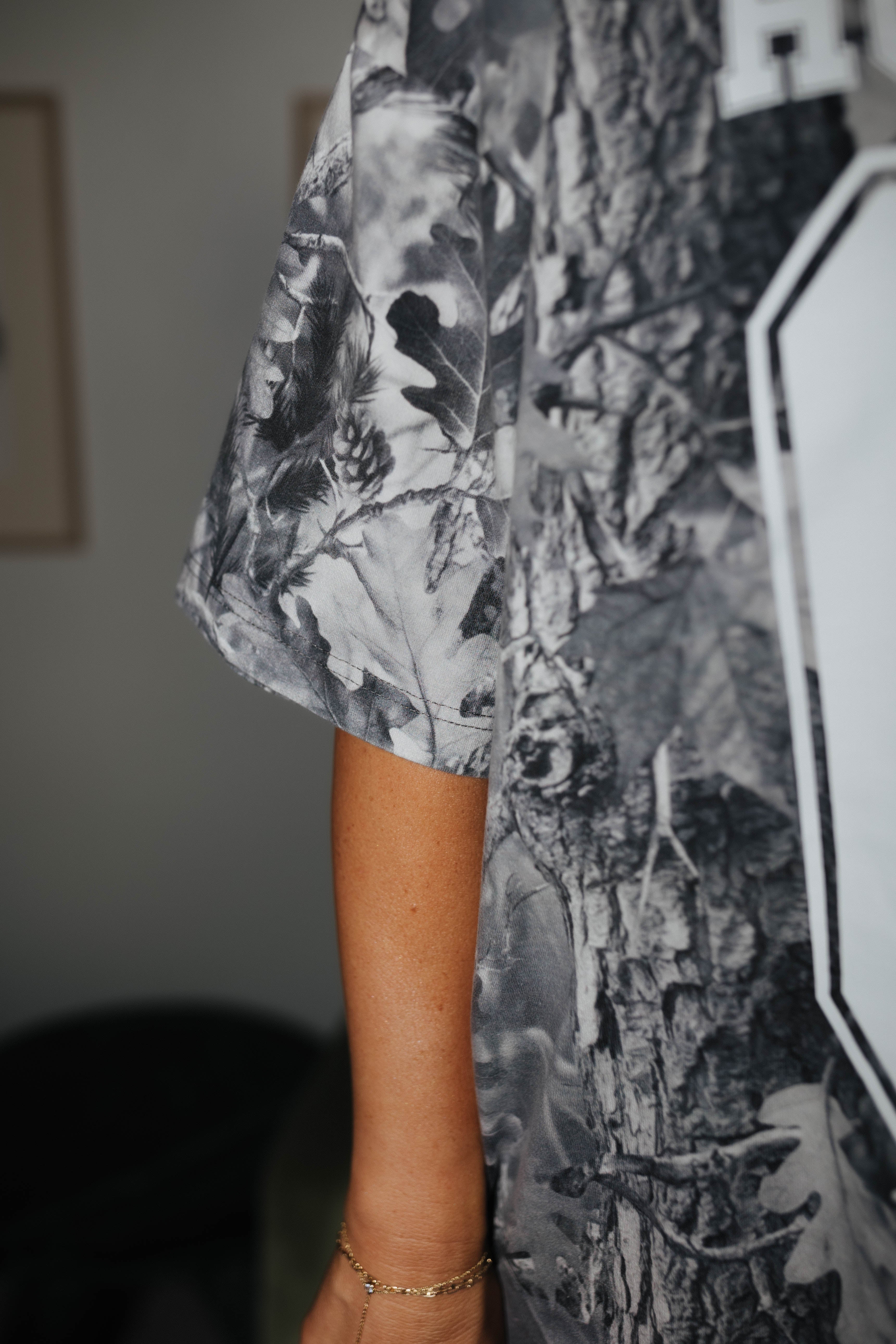 sleeve of camo tee 