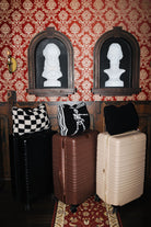 Staykation Halloween collection lifestyle photo featuring Black Waffle Quillow 50x60 and Black Waffle Fringe Blanket 90x90 and Sand & Black Check Quillow 50x60