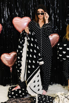 Matching pajamas to the black and white heart blanket