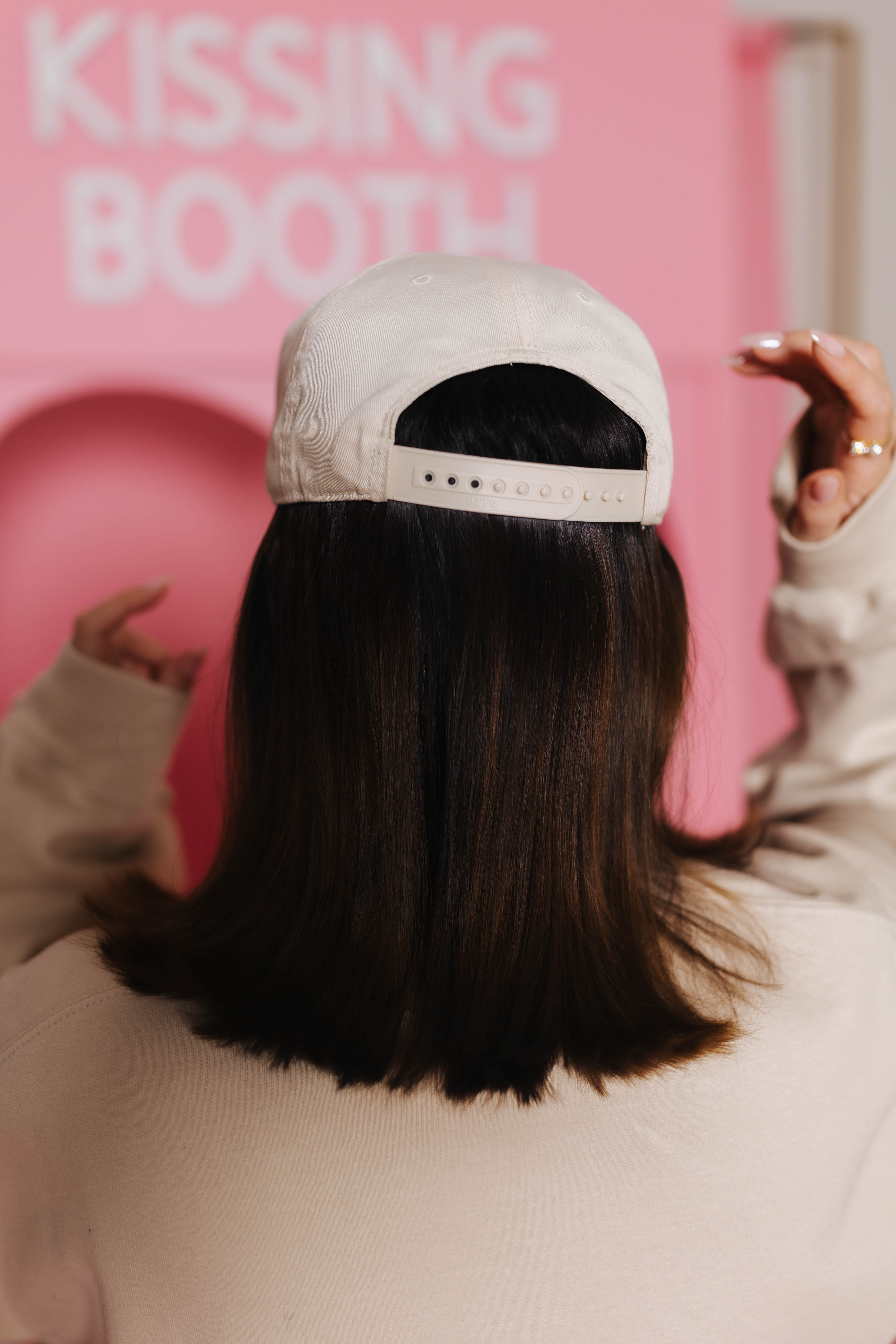 back of hat showing adjustable strap