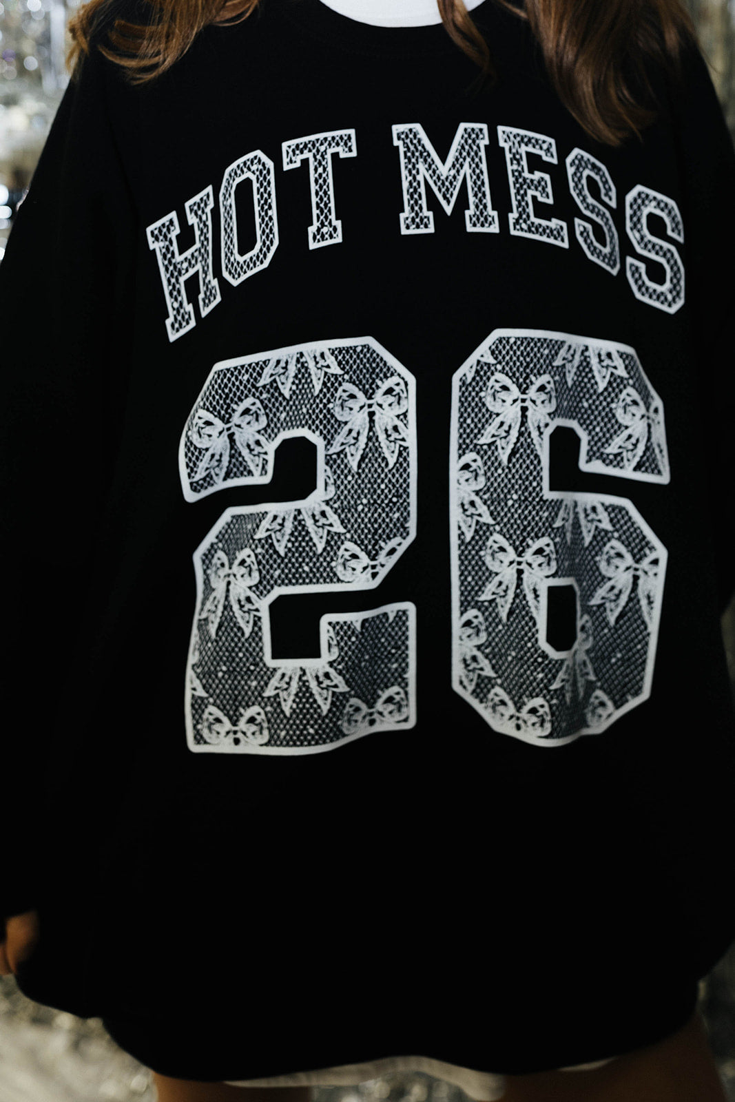 Close up of "Hot Mess 26" Lace detailing sweatshirt 