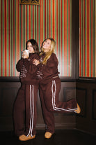 Brown Sweatpants styled in the Halloween campaign setting