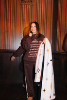 Brown Sweatpants shown in a second full length view