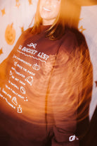 Fall Bucket List Sweatshirt shown in a full length lifestyle view