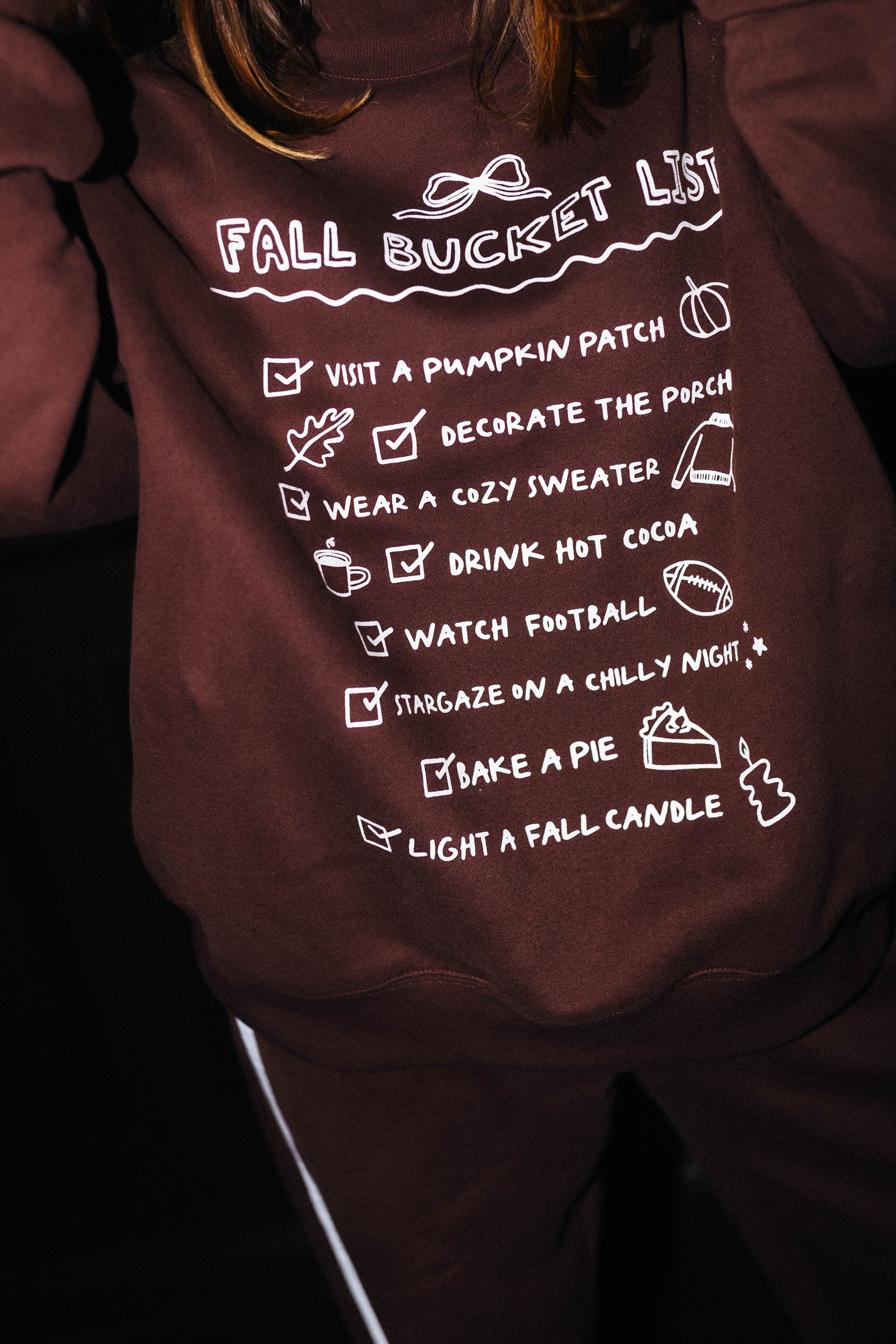Close view of the Fall Bucket List sweatshirt graphic
