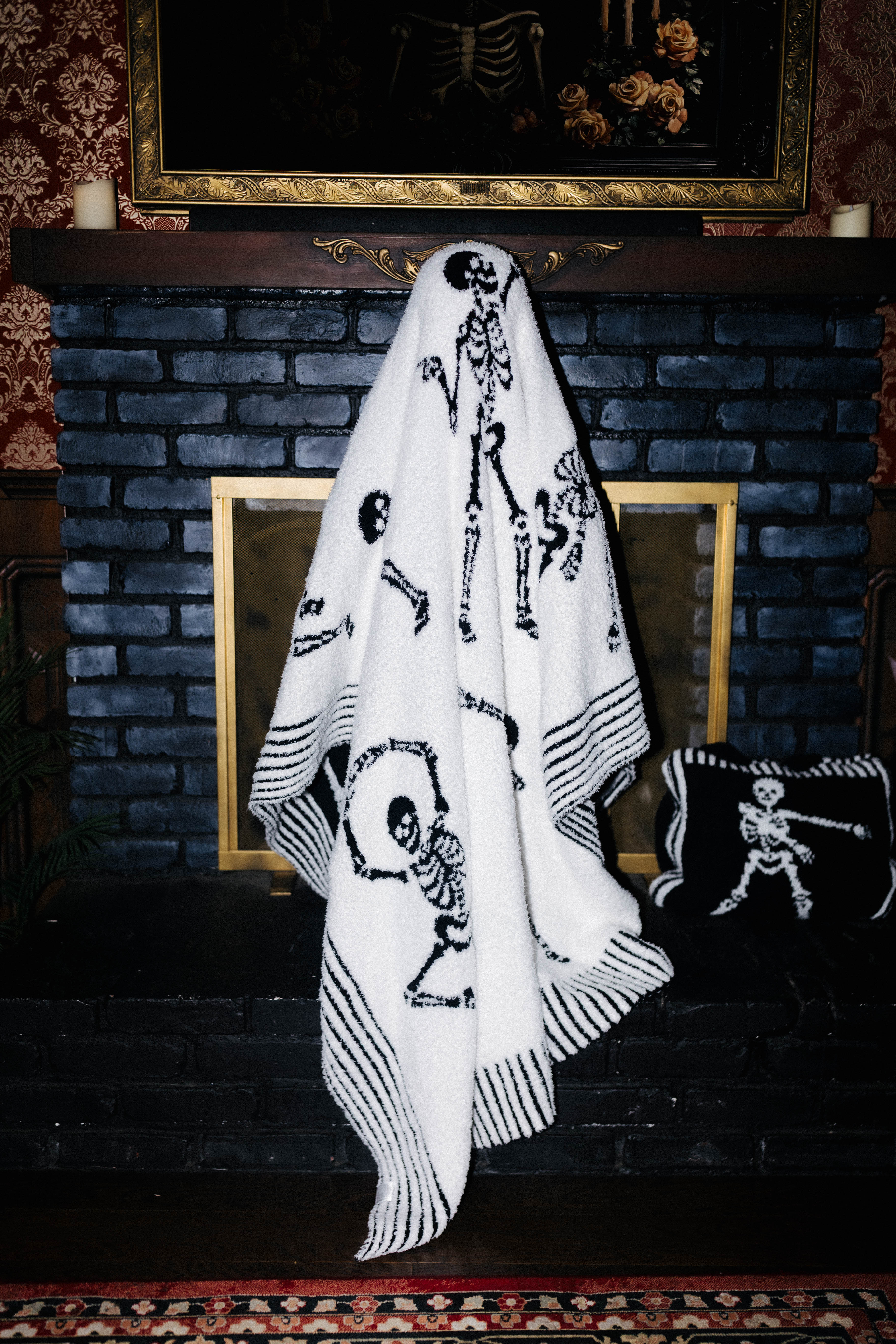 Skelly Blanket 60x80 styled in the Halloween campaign setting