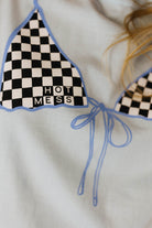 Checkered bikini top with 'HOT MESS' text on a white background