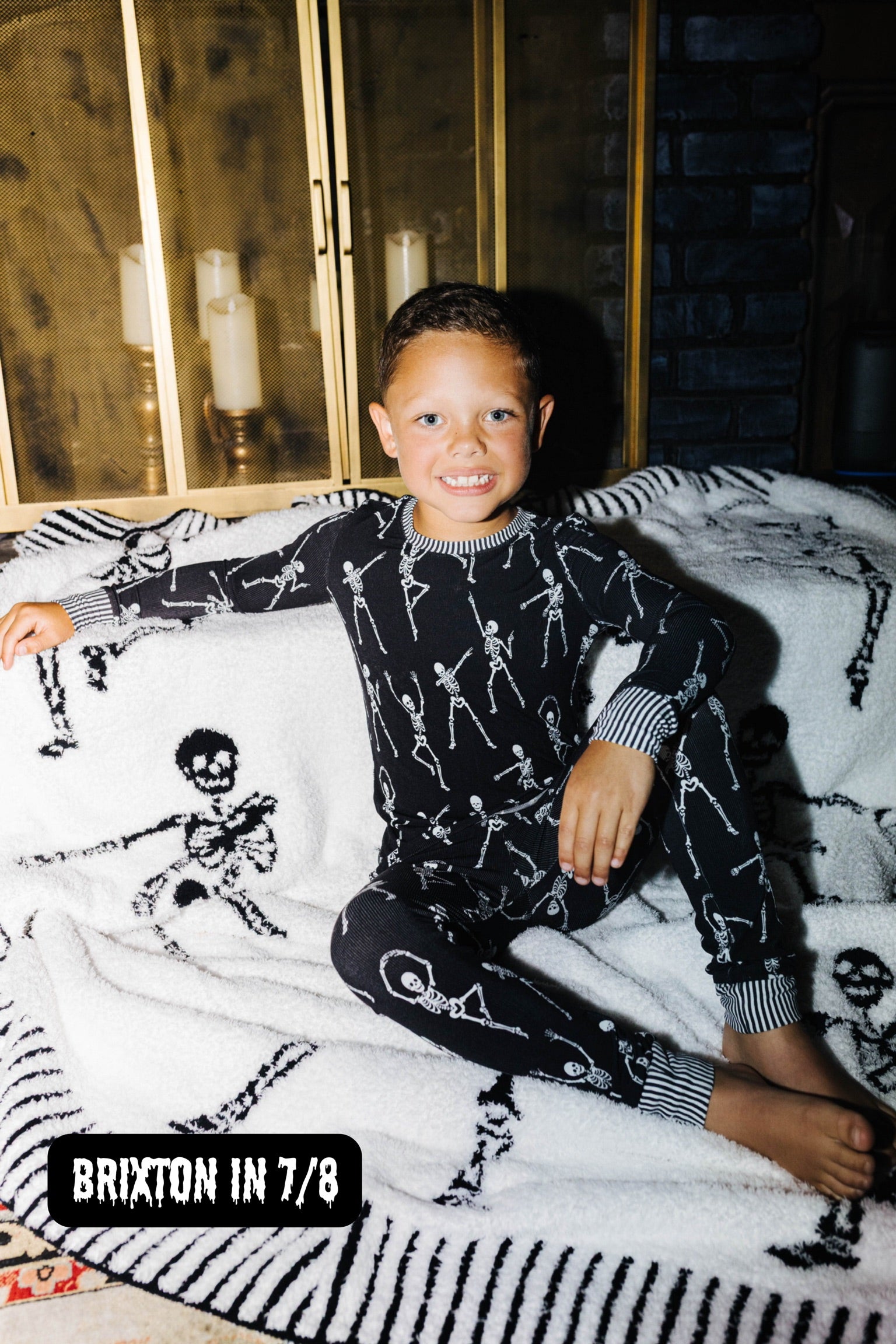 Britton wearing size 7/8 in the Kid Skelly Ribbed Pajama Set