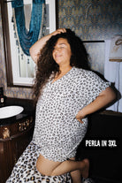 Perla wearing size 3XL in the Adult Leopard Ruffle Pajama Set