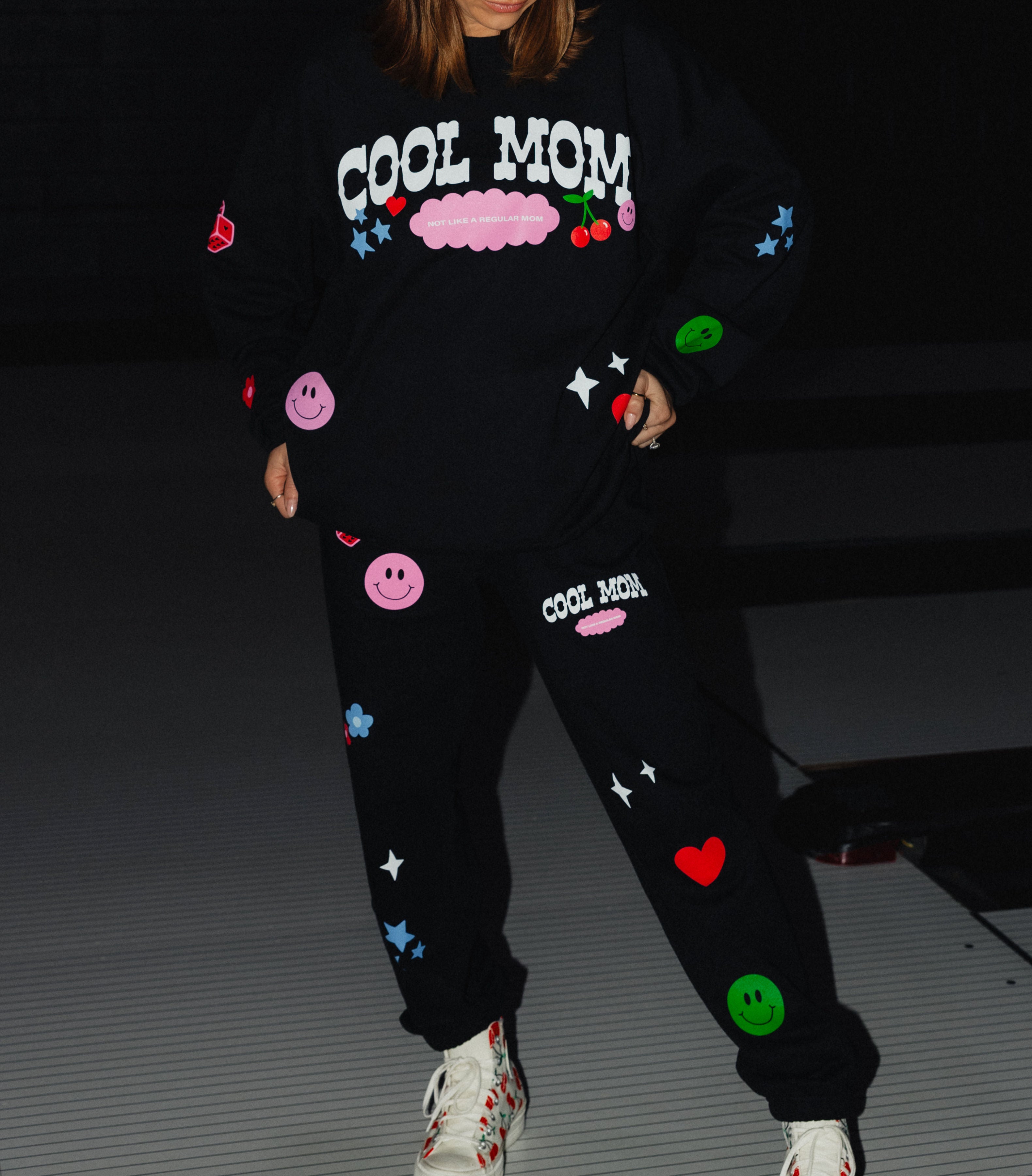 closer photo of the detailing with stars, cherry, heart, and smileys