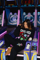 Krista posing showing off the cool mom set and sweatpants