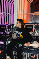 Another detail shot of Boston holding the basketball showing off the set