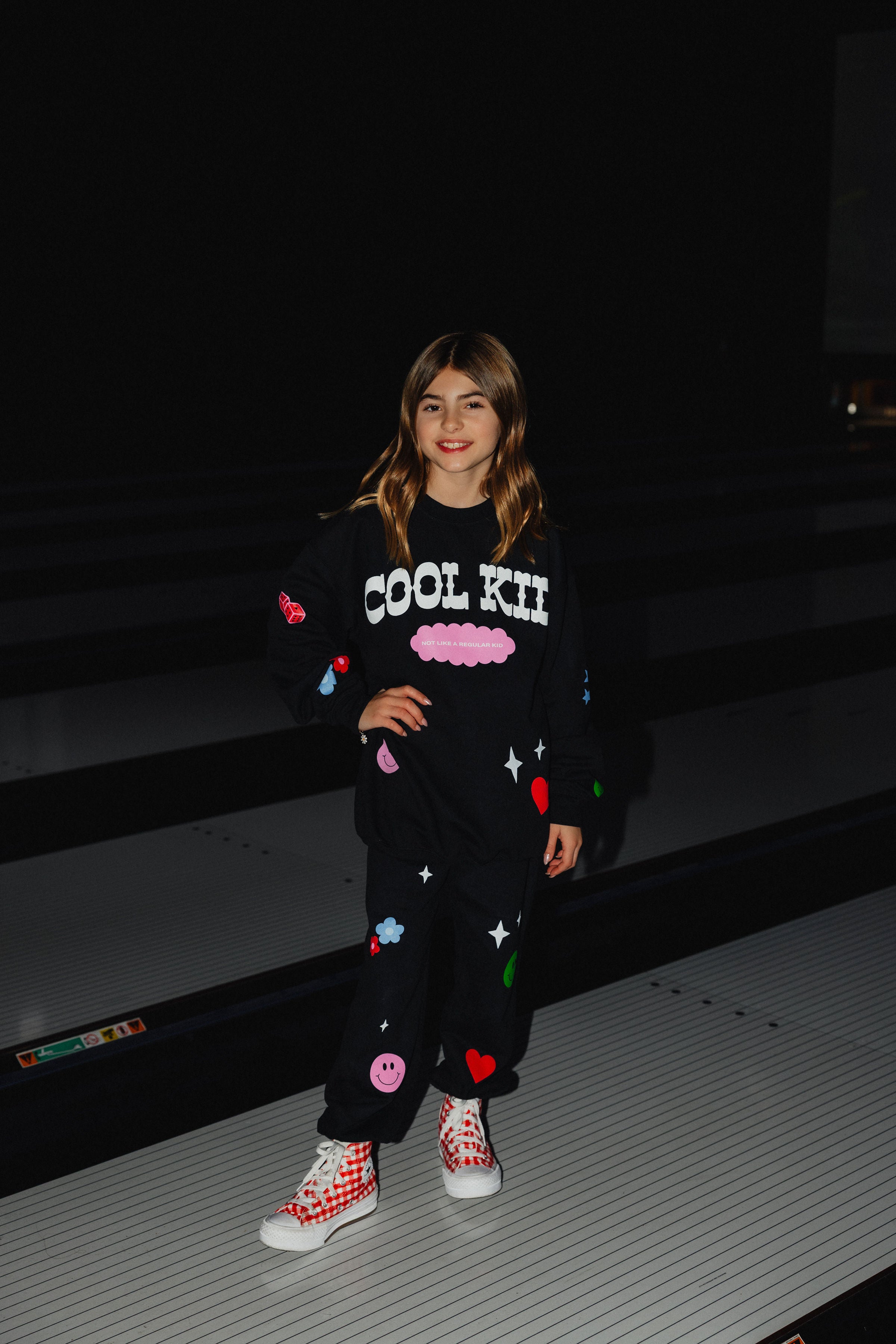 Full pic of Kolly in the icon sweatpants and sweatshirt. 