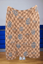 Back of the basketball blanket showing mostly orange color